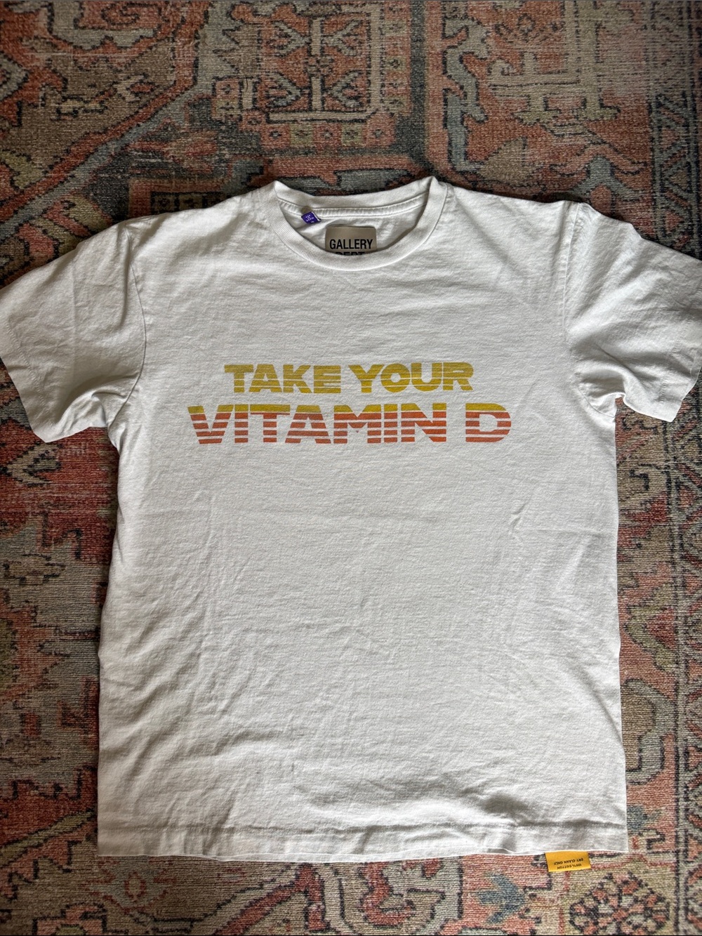 Gallery White Tee with Yellow and Orange 'Take Your Vitamin D' Script